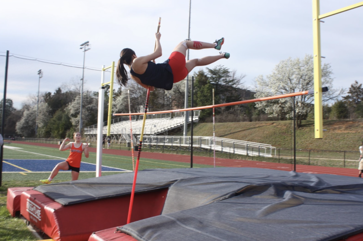Launching herself with just a pole, sophomore Sydney Eom maneuvers her body up and over the 6-foot-high bar. After being introduced to pole vaulting by a senior last year, Eom now regularly competes in the event. “It's definitely a bit scary at first, but I ​​found out it was really fun,” Eom said. 